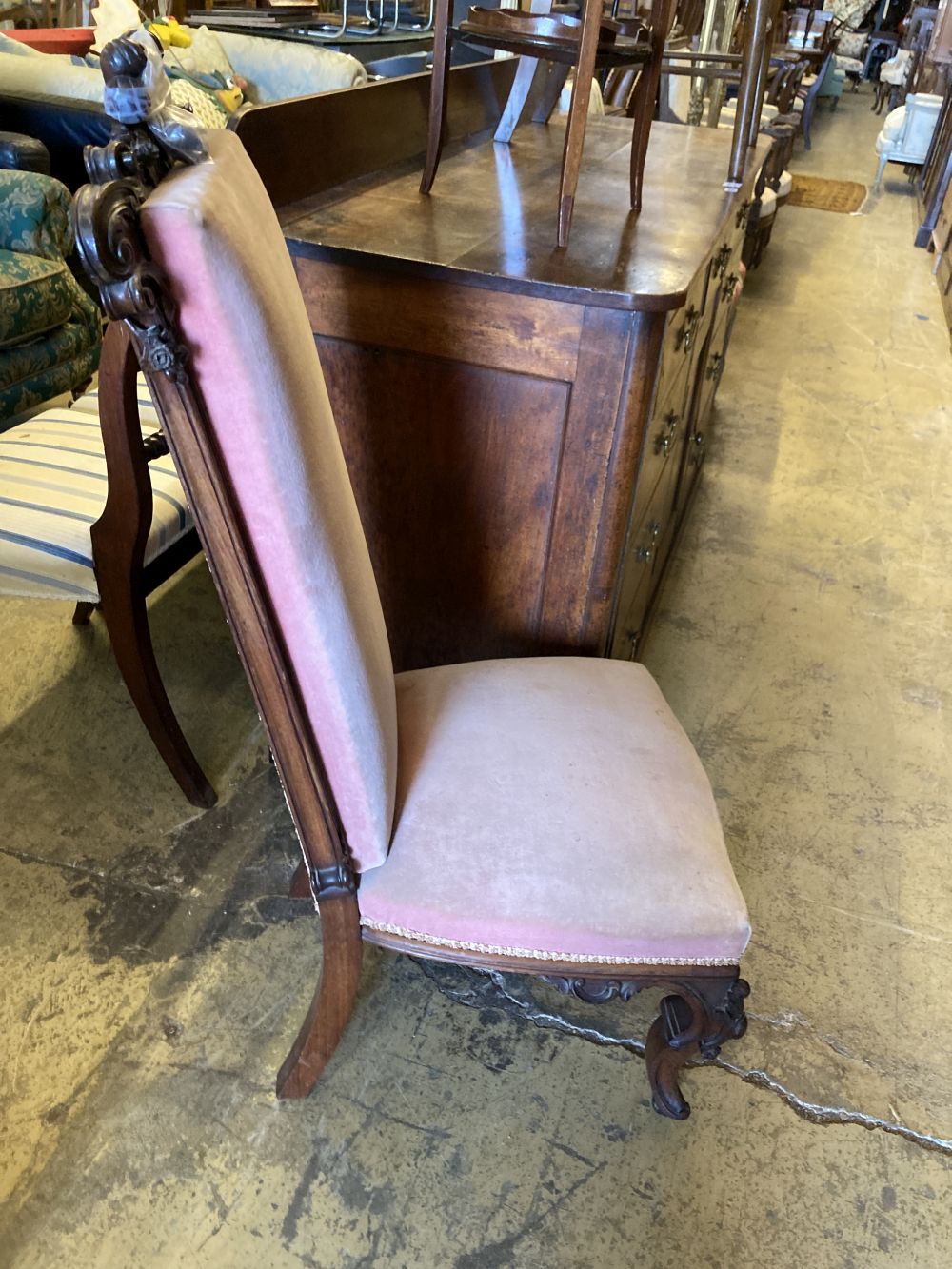 A Victorian carved rosewood prie dieu chair